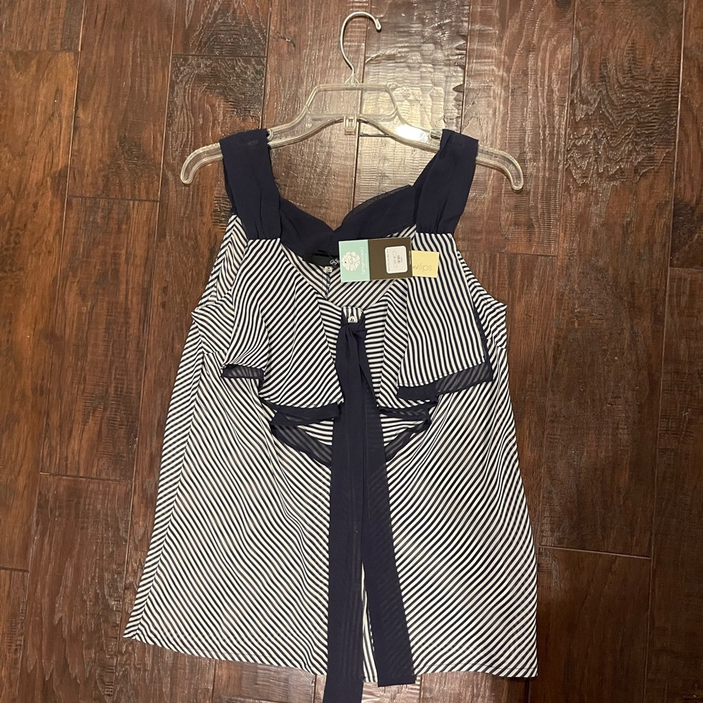 Cute top bought from a boutique NWT size M